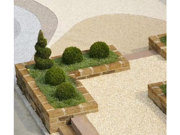 donice z tufu wulkanicznego w kolorze ciemnego karmelu z i z karmnikiem ościstym